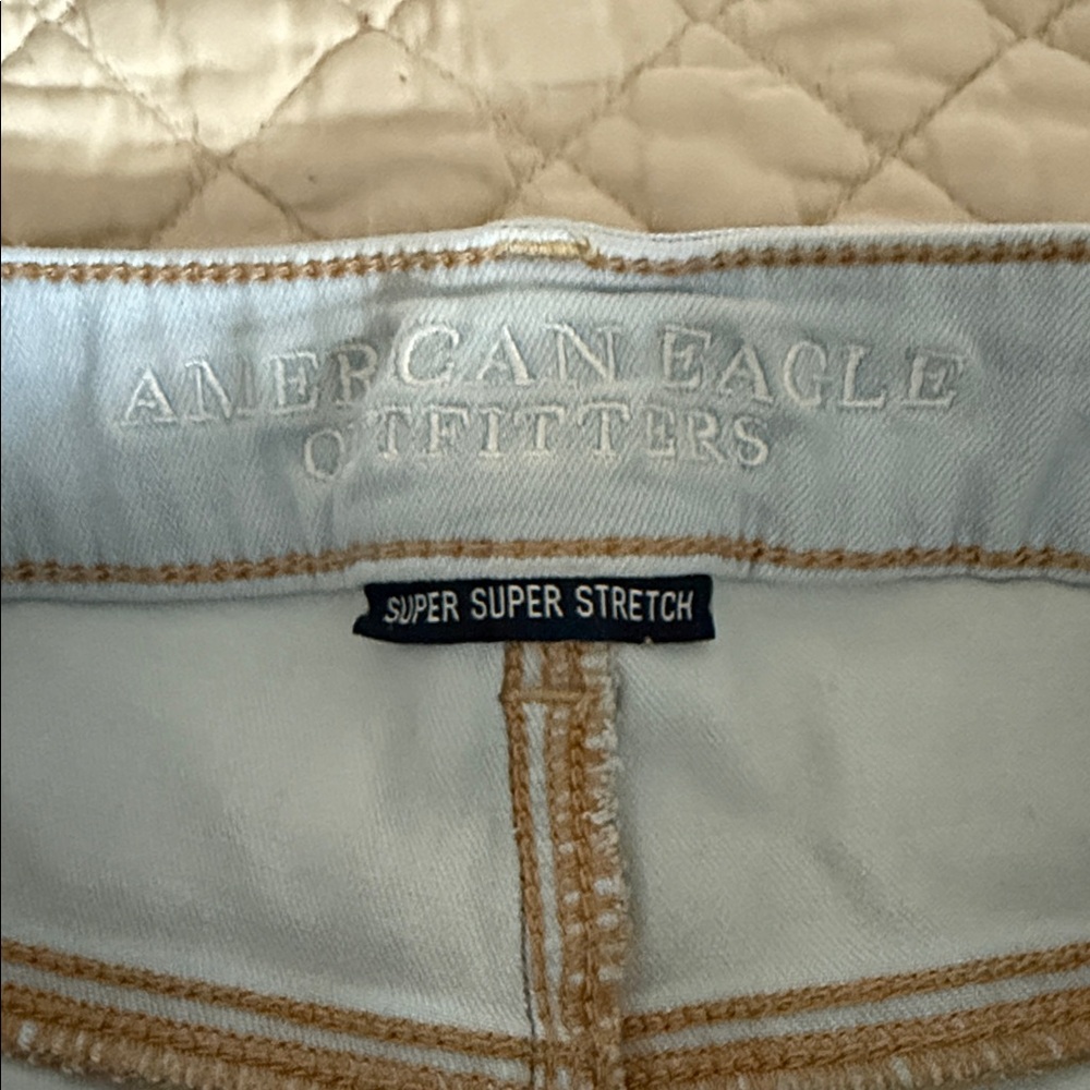 American Eagle Midi 12 Light Blue Distressed Jean Shorts - Picture 2 of 8